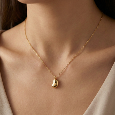 Collier haricot doré en acier inoxydable