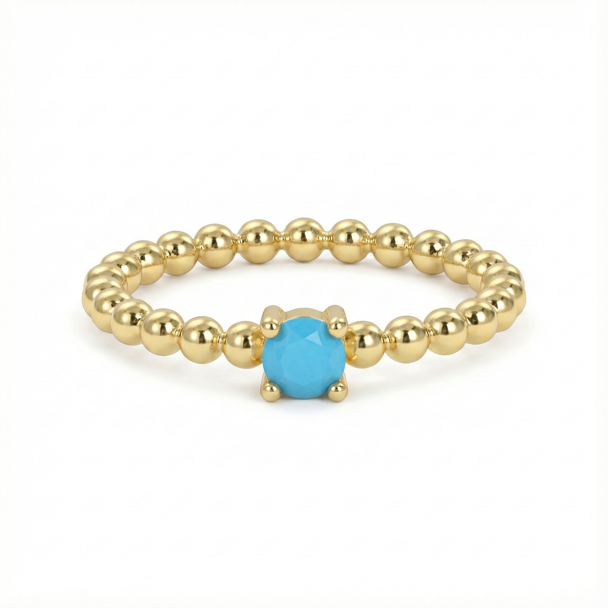 Bague dorée or 18k à anneau perlée avec pierre turquoise facettée centrale, bijou fin et lumineux