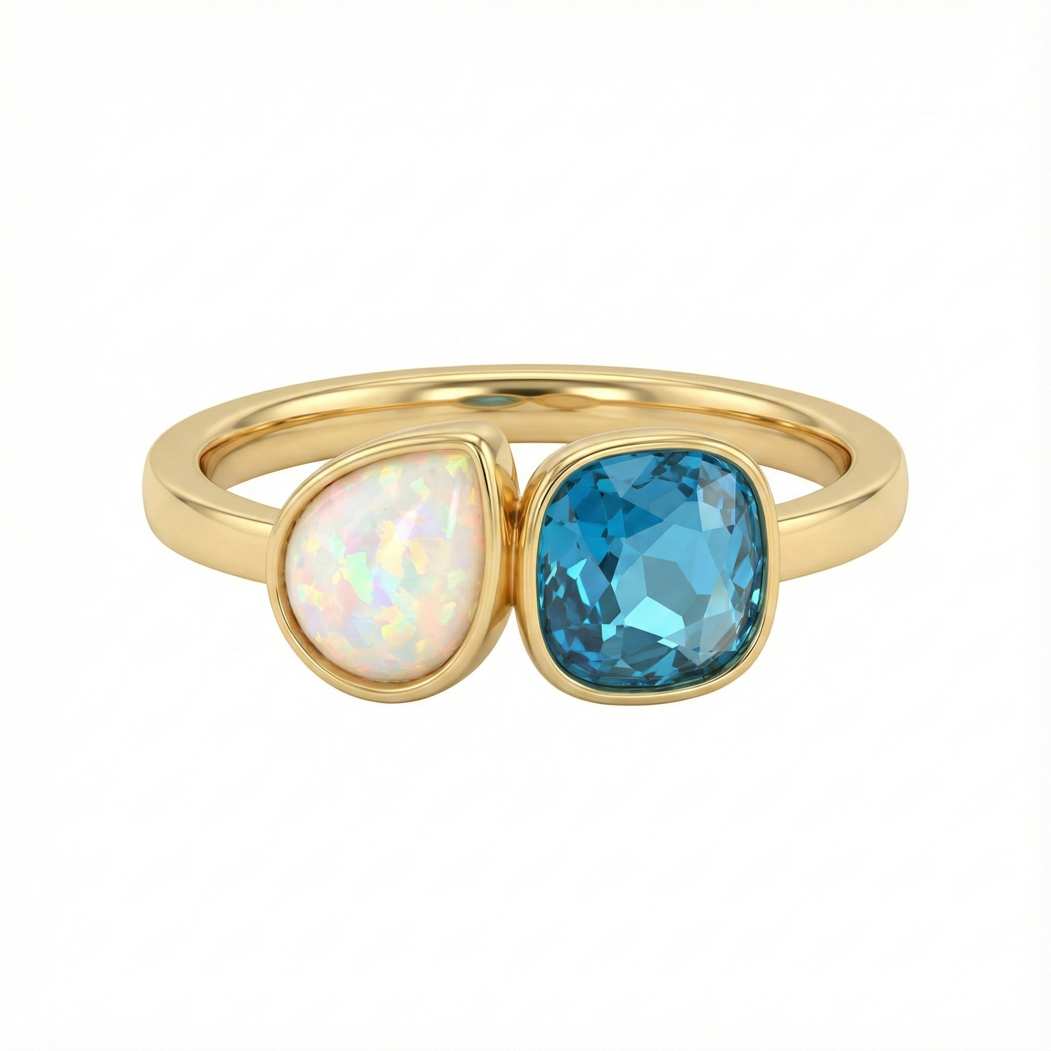 Bague dorée or 18k avec pierre bleue facettée et opale blanche, design asymétrique lumineux et élégant