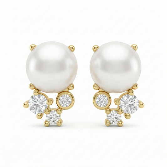 Boucles d’oreilles clous dorées or 18k avec perle blanche et trois zircons