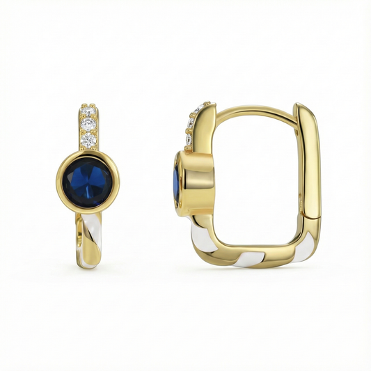 Boucles d’oreilles dorées or 18k rectangulaires avec pierre bleue facettée, ligne de zircons et émail blanc, design graphique élégant