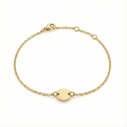 Bracelet chaîne fine dorée avec disque central lisse