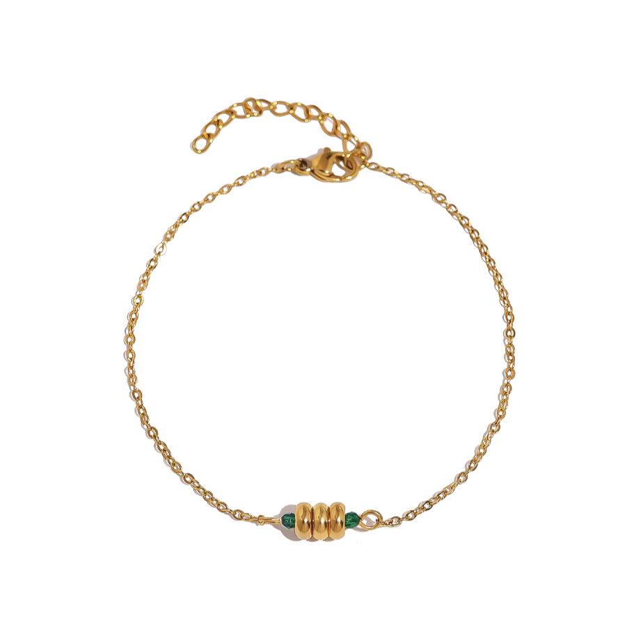 Ce bracelet chaîne fin et délicat associe une base dorée à des perles cristal vert pour une touche subtile et élégante. Idéal au quotidien ou en accumulation, il illumine le poignet tout en restant discret.
Matériaux : Acier inoxydable doré PVD 18K – perles en cristal. Résiste à l’eau, hypoallergénique.
Dimensions : Longueur : 16,5 + 3 cm – motif central : 0,4 cm – poids : 1 g.
Style : Un bijou minimaliste et raffiné, parfait pour un look léger et féminin. À porter seul ou en superposition avec d’autres