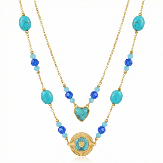 Collier doré double rang avec perles turquoise, cœur et médaillon solaire