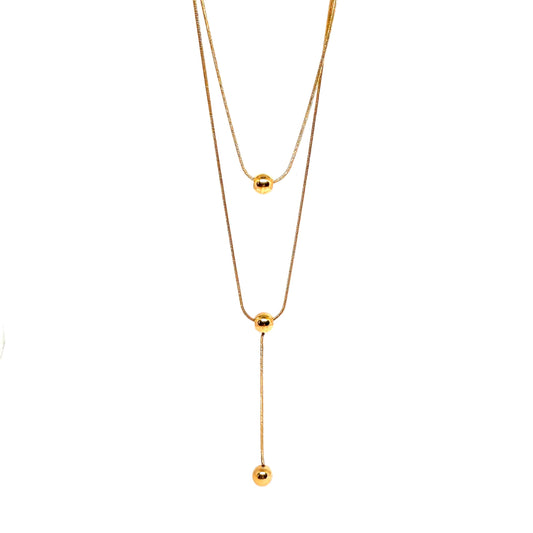 collier femme double rang en acier inoxydable doré avec deux perles sphériques et pendentif vertical, longueur 38 et 45,5 +5 cm, bijou minimaliste et élégant au style contemporain