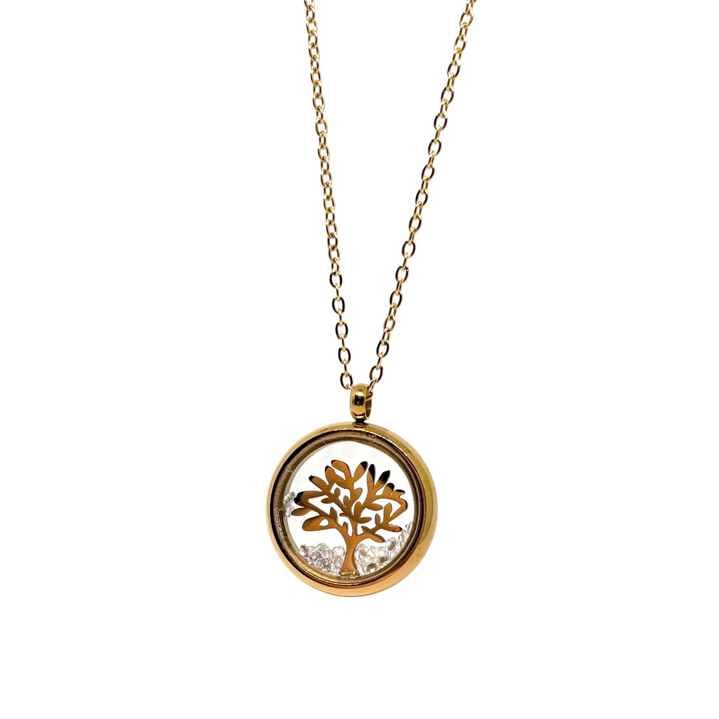 Collier doré pour femme en acier inoxydable avec médaillon rond transparent renfermant un arbre de vie doré et des éclats de cristal. Bijou lumineux et spirituel, résistant à l’eau et hypoallergénique, symbole d’harmonie et de croissance intérieure