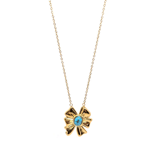 Collier doré pour femme avec pendentif nœud sculptural et pierre turquoise ovale. Bijou artistique en acier inoxydable, résistant à l’eau et hypoallergénique, au design expressif et moderne idéal pour un style arty ou bohème chic