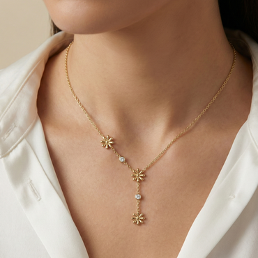 Collier fleurs asymétriques en acier inoxydable doré avec cristaux