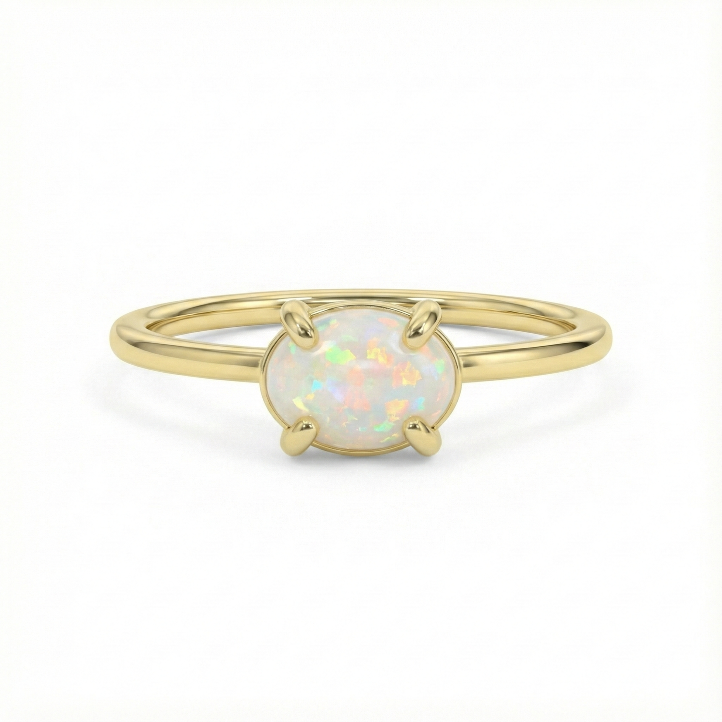 Bague dorée or 18k fine avec pierre opale ovale aux reflets irisés, bijou minimaliste lumineux et élégant