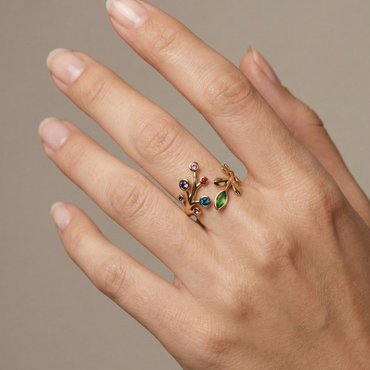 Bague en acier inoxydable couleur doré avec design branches et cristaux multicolores