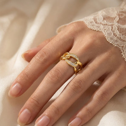 Bague dorée or 18K en forme de chaîne avec zircons, modèle ouvert ajustable.