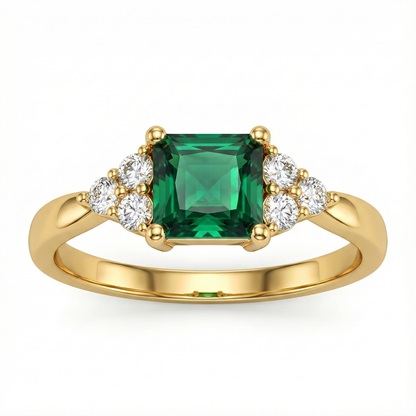 Bague doré à l’or 18k avec pierre verte taille émeraude et zircons