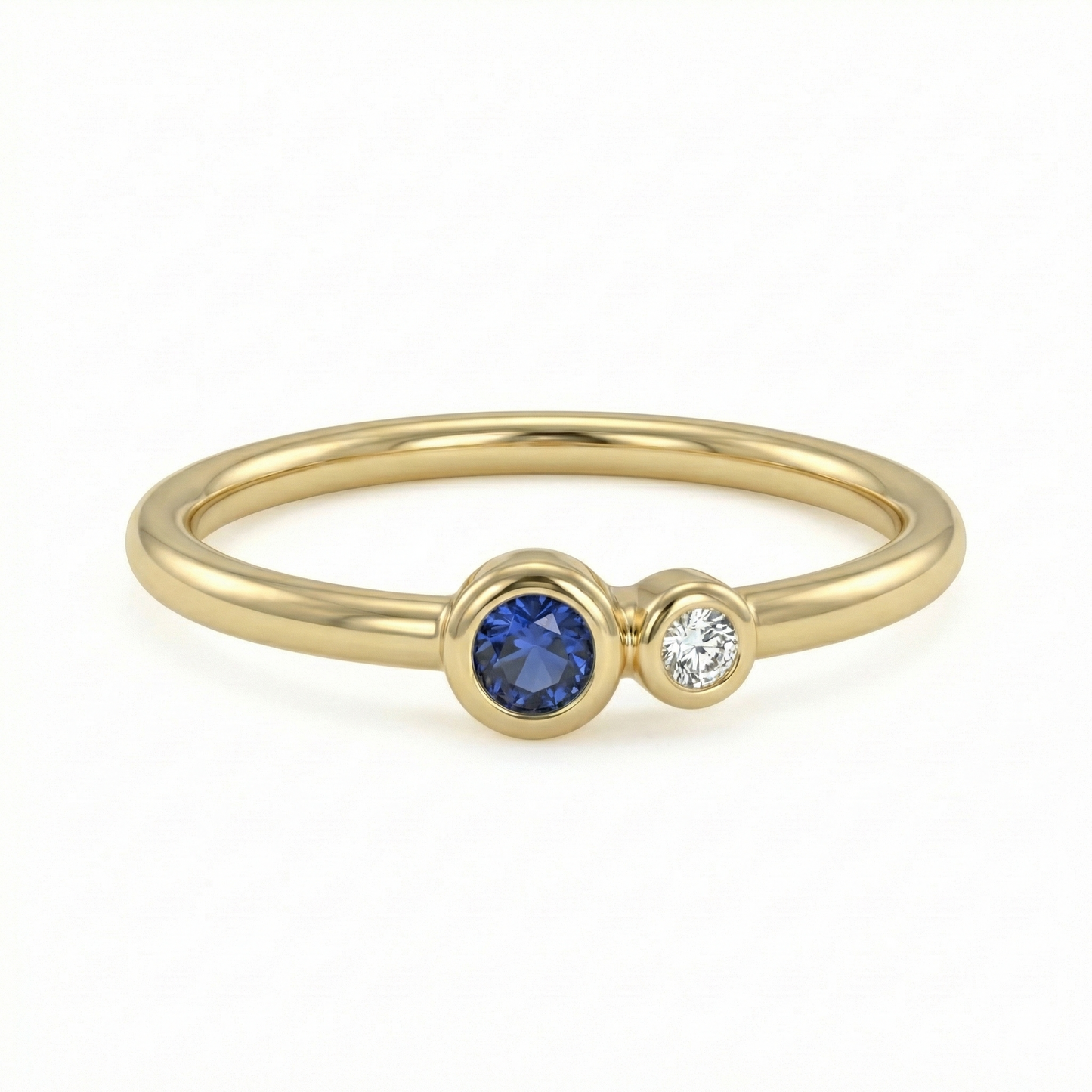 Bague dorée or 18k fine avec pierre bleue ronde et zircon blanc décentrés