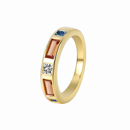 Bague dorée or 18K pour femme, ornée de zircons multicolores rectangulaires et carrés dans des tons bleu saphir, orange ambré et blanc lumineux, au design géométrique moderne et raffiné, parfaite pour un style contemporain et audacieux.