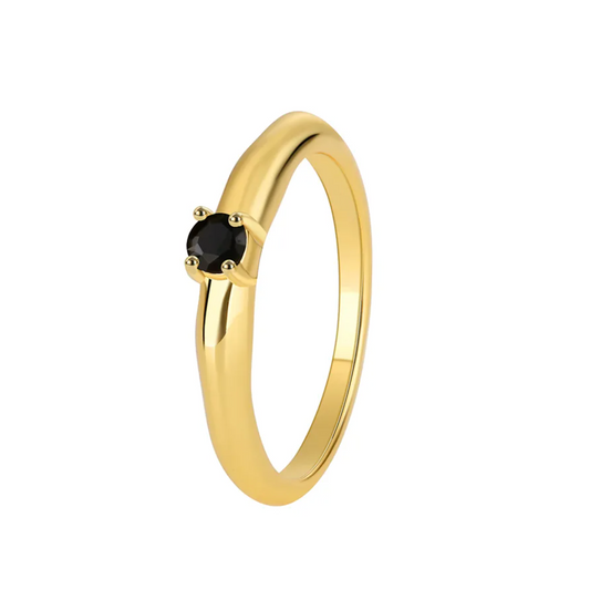 Bague femme dorée en or 18K avec pierre noire ronde facettée sertie en solitaire. Bijou minimaliste et élégant, au contraste raffiné entre doré et noir, parfait pour un style chic et intemporel