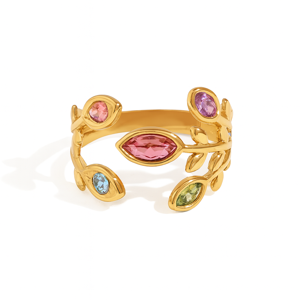 Inspirée par la nature, cette bague dorée en forme de branches feuillues, incrustée de cristaux colorés, allie finesse organique et éclat précieux. Un bijou poétique et moderne, parfait pour illuminer la main avec originalité.