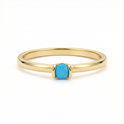 Bague fine dorée or 18k avec pierre turquoise facettée, design minimaliste élégant