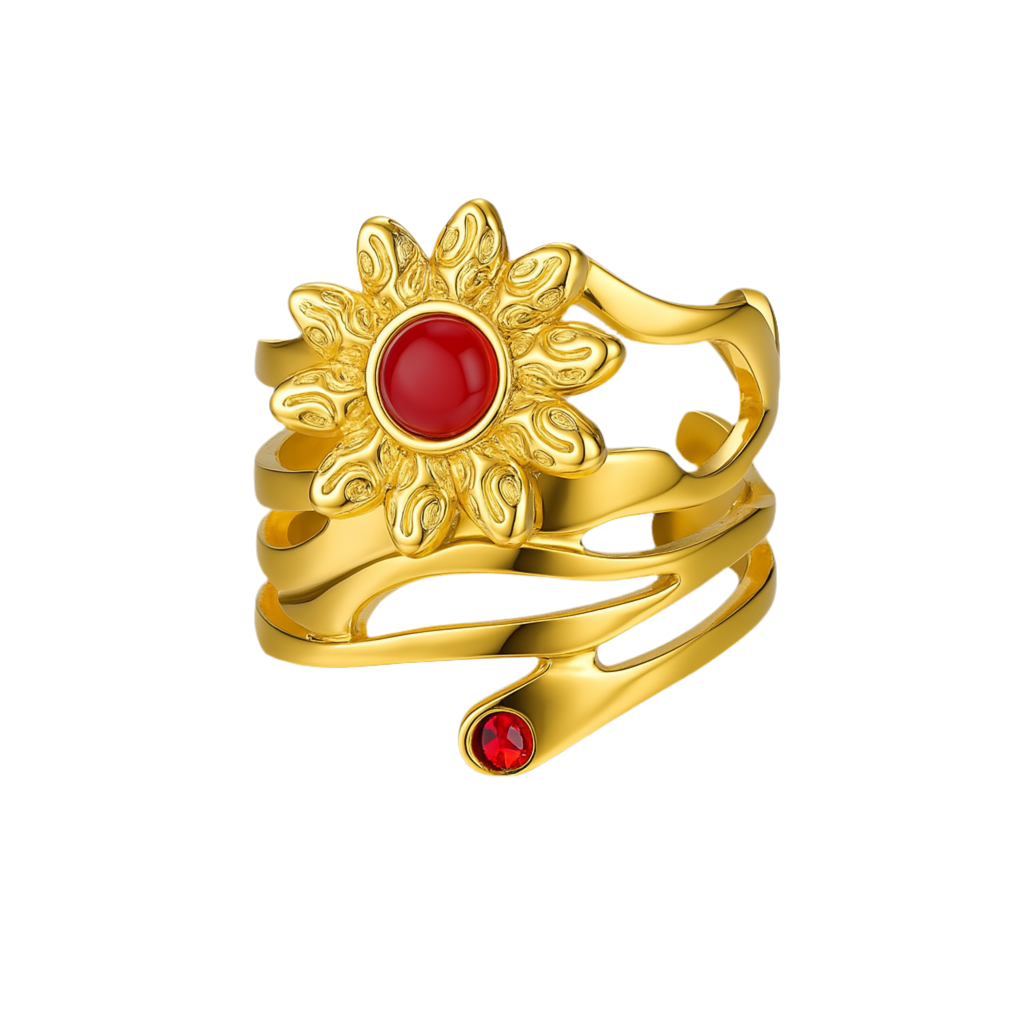 Inspirée de la puissance symbolique du soleil, cette bague dorée ornée d’une fleur rayonnante se distingue par sa pierre rouge intense au cœur du motif. La structure de l’anneau évoque un mouvement fluide, presque végétal, avec ses courbes libres qui épousent le doigt tout en légèreté.
