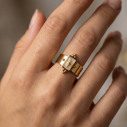 Bague géométrique en acier inoxydable doré avec pierre claire