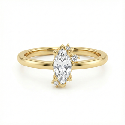 Bague marquise dorée or 18k avec pierre centrale scintillante et entourage de zircons blancs, design fin et élégant