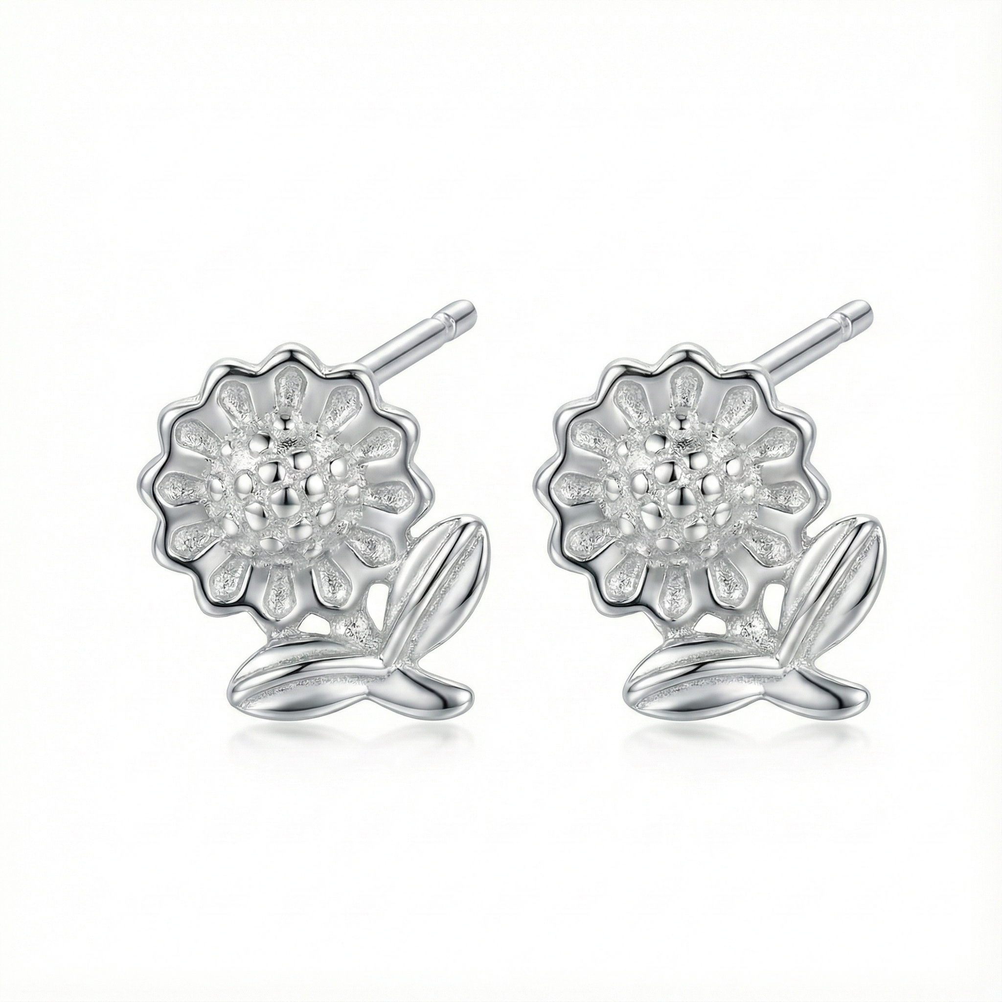 Idée cadeau fille : petites puces d'oreilles motif fleur en argent massif 925, bijou mignon et hypoallergénique.