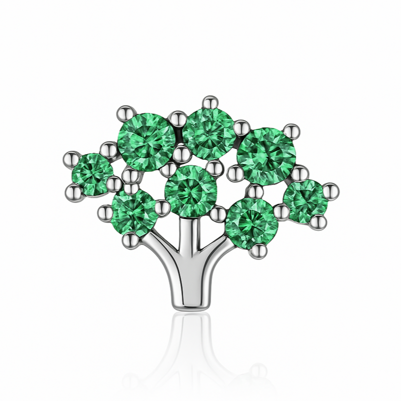 Ajoutez une touche de symbolisme et de couleur à votre look avec cette boucle d'oreille puce en argent 925, représentant un petit arbre de vie et ornées de zircons verts émeraude. Un design délicat et raffiné, parfait pour un look naturel et élégant.