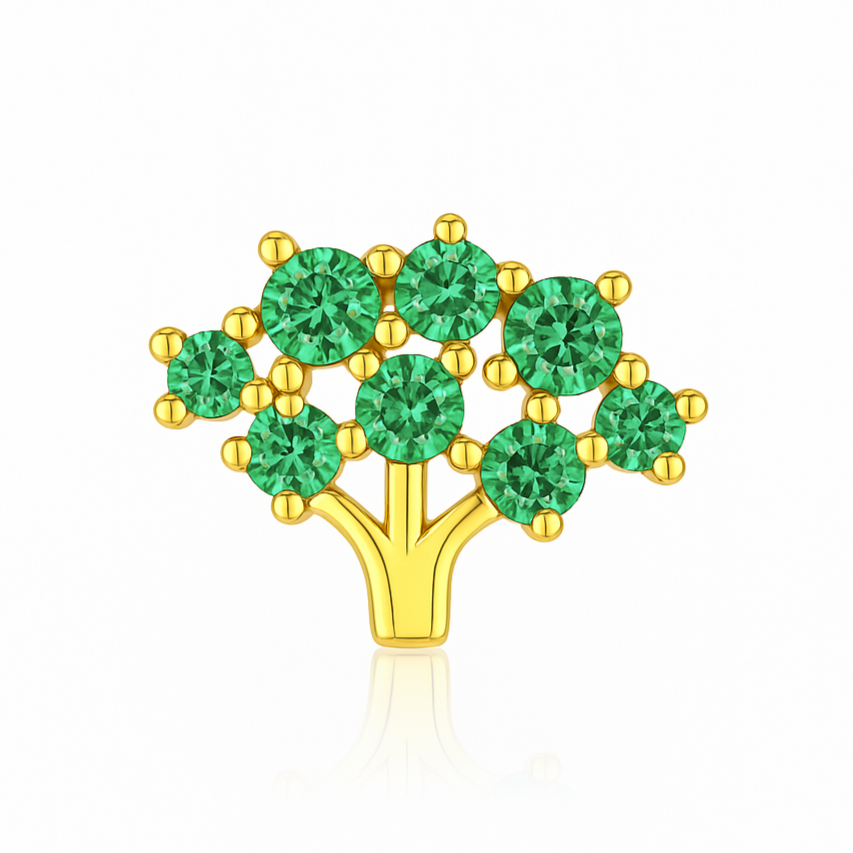 Ajoutez une touche de symbolisme et d’éclat doré à votre look avec cette boucle d’oreille puce en argent 925 doré à l’or fin, représentant un petit arbre de vie délicatement orné de zircons verts émeraude. Un design raffiné qui allie l’élégance intemporelle au pouvoir symbolique.