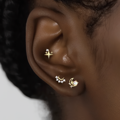 Ajoutez une touche d'élégance et de mystère à votre look avec cette boucle d'oreille unique en argent 925 doré à l'or fin, ornée d'une somptueuse opale et d'un éclatant zircon. L'opale, avec ses reflets chatoyants et colorés, est magnifiquement mise en valeur par le zircon brillant, créant un contraste subtil et raffiné. L'argent 925 doré à l'or fin apporte une finition luxueuse et intemporelle, garantissant un bijou à la fois durable et élégant, parfait pour toute occasion.