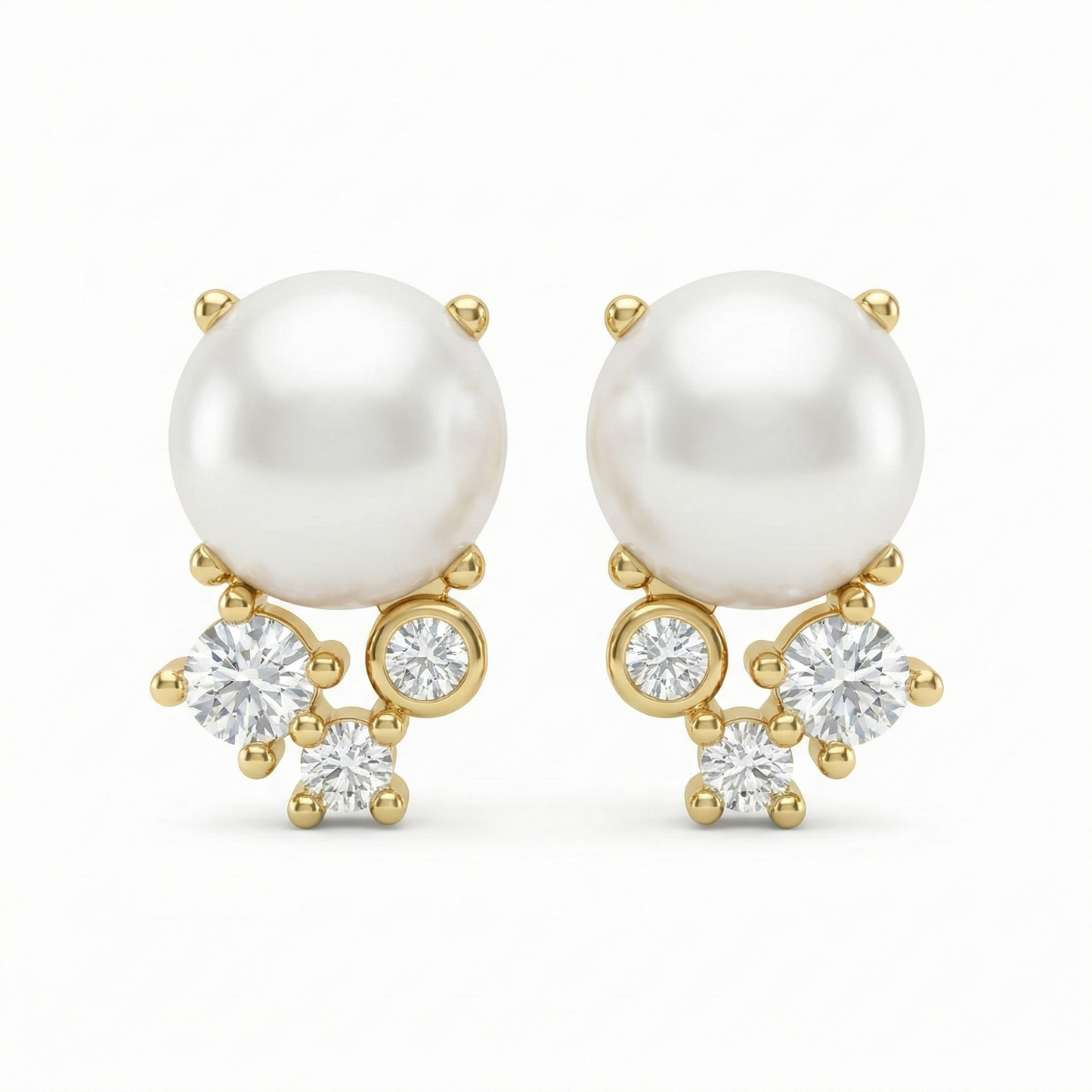 Boucles d’oreilles clous dorées or 18k avec perle blanche et trois zircons