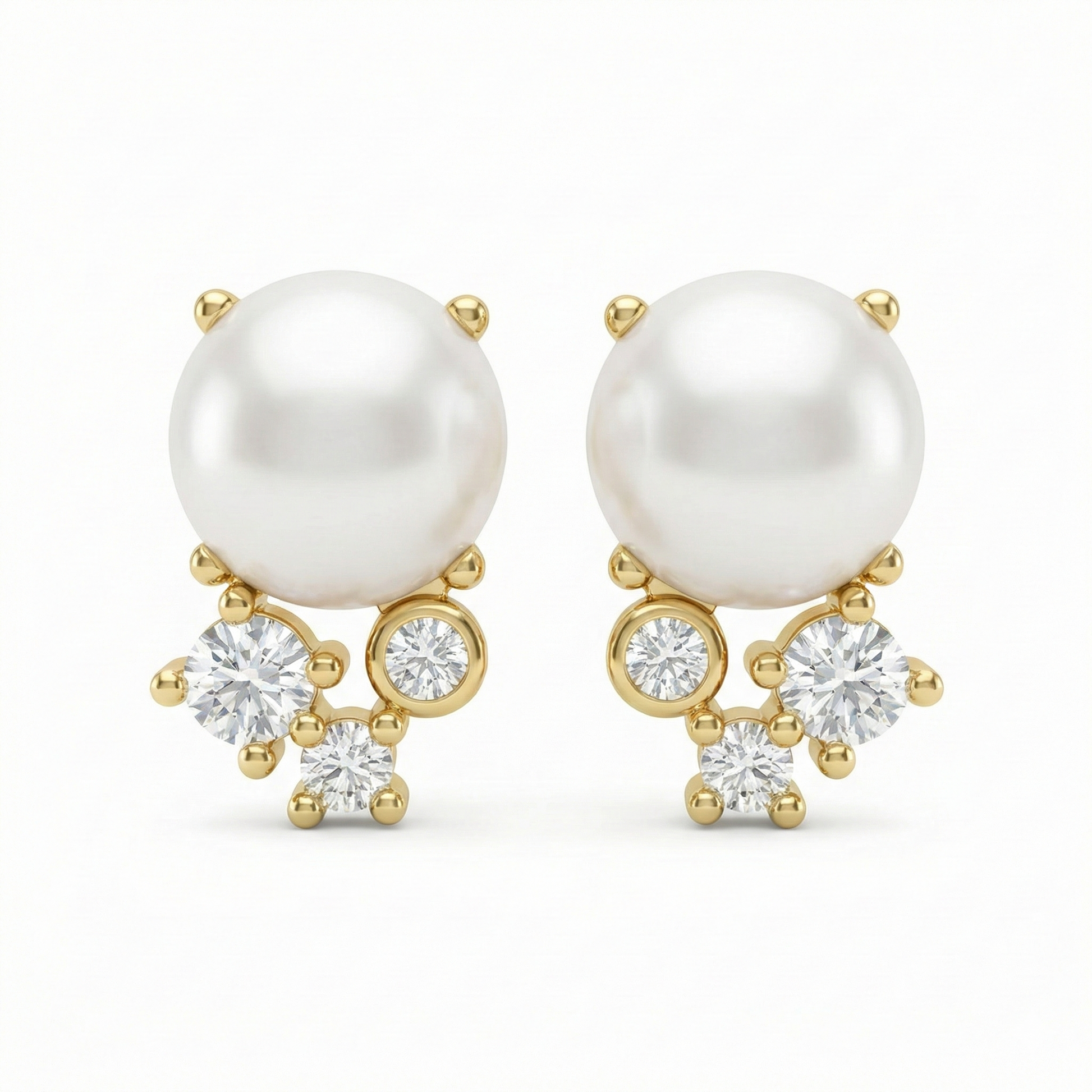 Boucles d’oreilles clous dorées or 18k avec perle blanche et trois zircons
