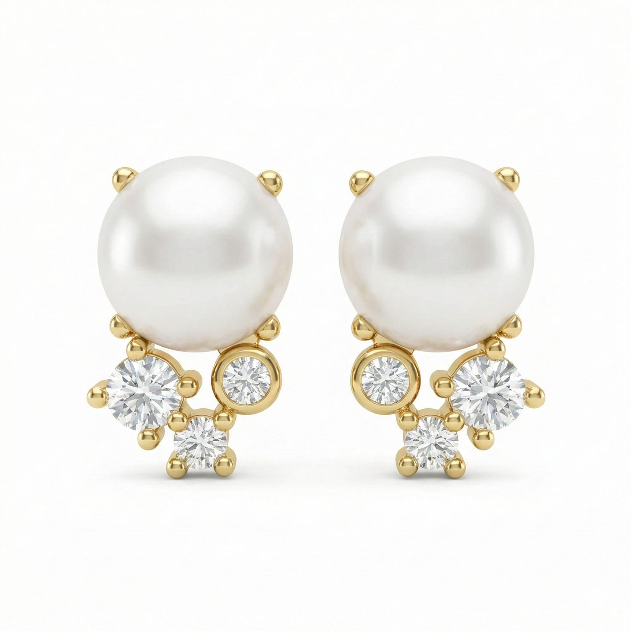 Boucles d’oreilles clous dorées or 18k avec perle blanche et trois zircons