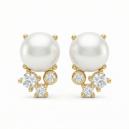 Boucles d’oreilles clous dorées or 18k avec perle blanche et trois zircons
