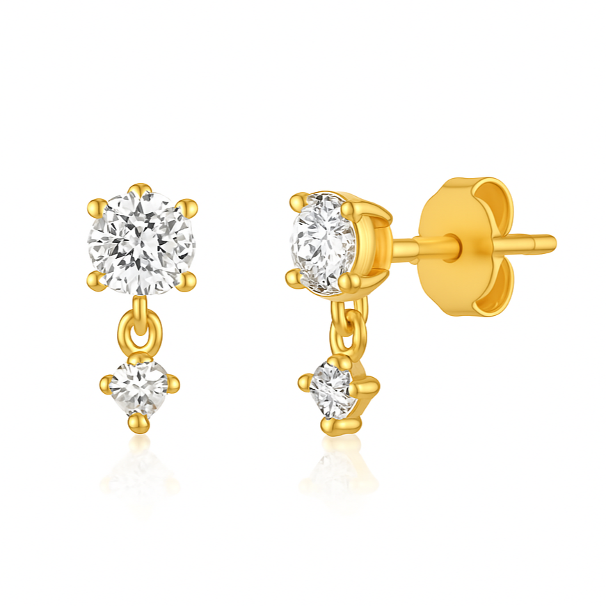 Ajoutez une touche de sophistication à votre look avec ces boucles d'oreilles en argent 925 doré à l'or fin, ornées de zircons. Chaque boucle présente un petit zircon suspendu, relié à trois petits zircons, créant un design élégant et lumineux.