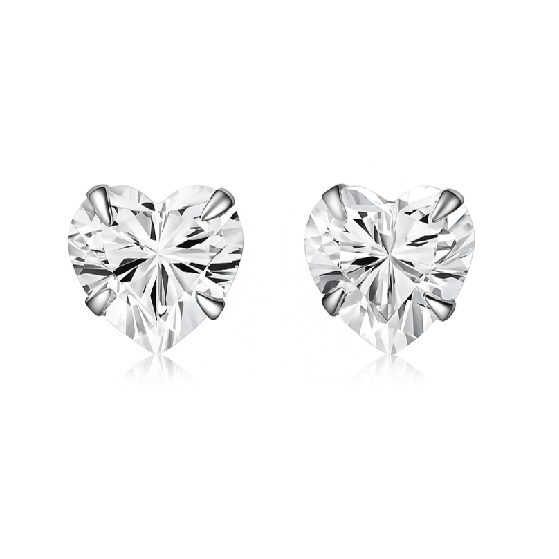 Ajoutez une touche d’éclat et de tendresse à votre look avec ces boucles d’oreilles puces en argent sterling 925, serties d’un zircon scintillant en forme de cœur de 3 mm. Leur design délicat et romantique apporte une lumière subtile et un charme discret à vos tenues, parfait pour celles qui recherchent un bijou à la fois simple, élégant et symbolique. Ces boucles sont idéales pour compléter vos tenues du quotidien ou pour offrir un cadeau plein d’amour et de douceur.