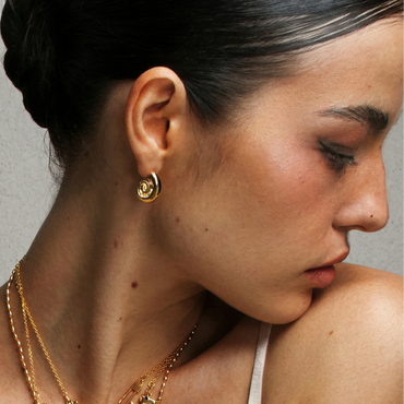 Boucles d’oreilles dorées en acier inoxydable en forme de spirale inspiration coquillage