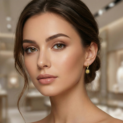 Boucles d'oreilles anneaux avec breloque (charms) soleil, bijou porte-bonheur symbolique en acier inoxydable doré.