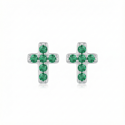 Boucles d'oreilles puces croix en argent 925 serties de zircons vert émeraude, style précieux et royal.
