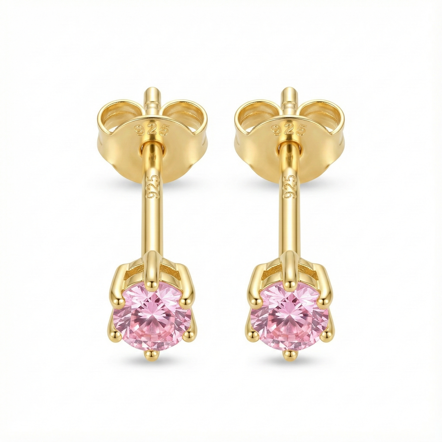 Boucles d'oreilles puces mariage ou cérémonie : zircon couleur rose pâle (rose poudré) sur monture argent doré.