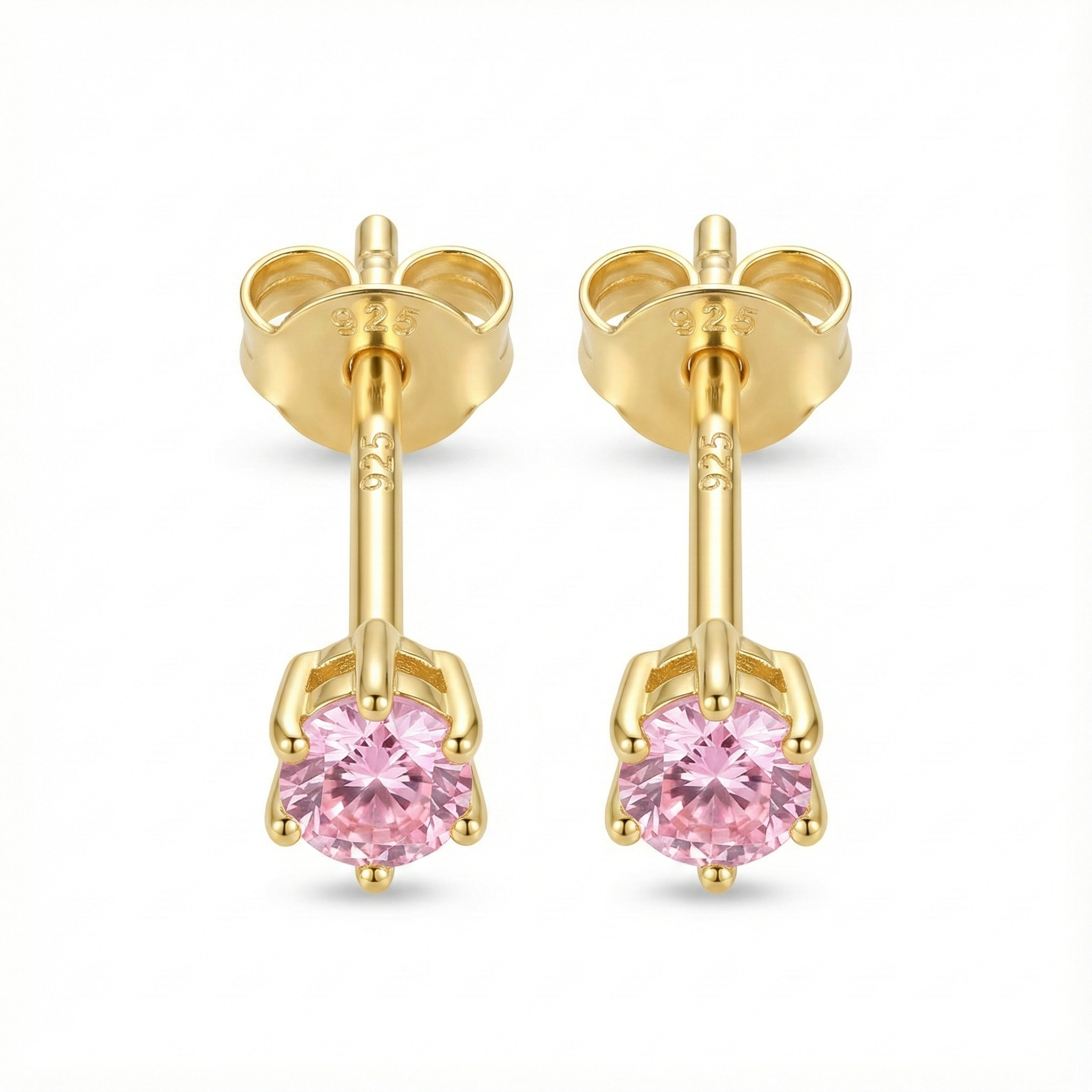 Boucles d'oreilles puces mariage ou cérémonie : zircon couleur rose pâle (rose poudré) sur monture argent doré.
