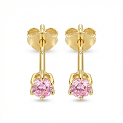 Boucles d'oreilles puces mariage ou cérémonie : zircon couleur rose pâle (rose poudré) sur monture argent doré.