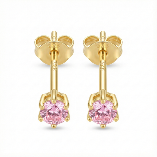 Boucles d'oreilles puces mariage ou cérémonie : zircon couleur rose pâle (rose poudré) sur monture argent doré.