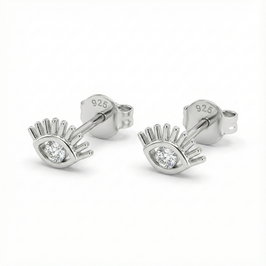 Boucles d'oreilles puces motif œil protecteur en argent 925, serties d'un oxyde de zirconium central brillant.