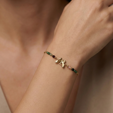 bracelet acier inoxydable doré soleil doré perles vertes vue large