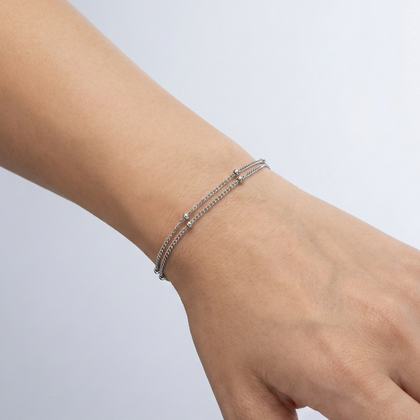 Bracelet double chaîne perlée argentée en acier inoxydable