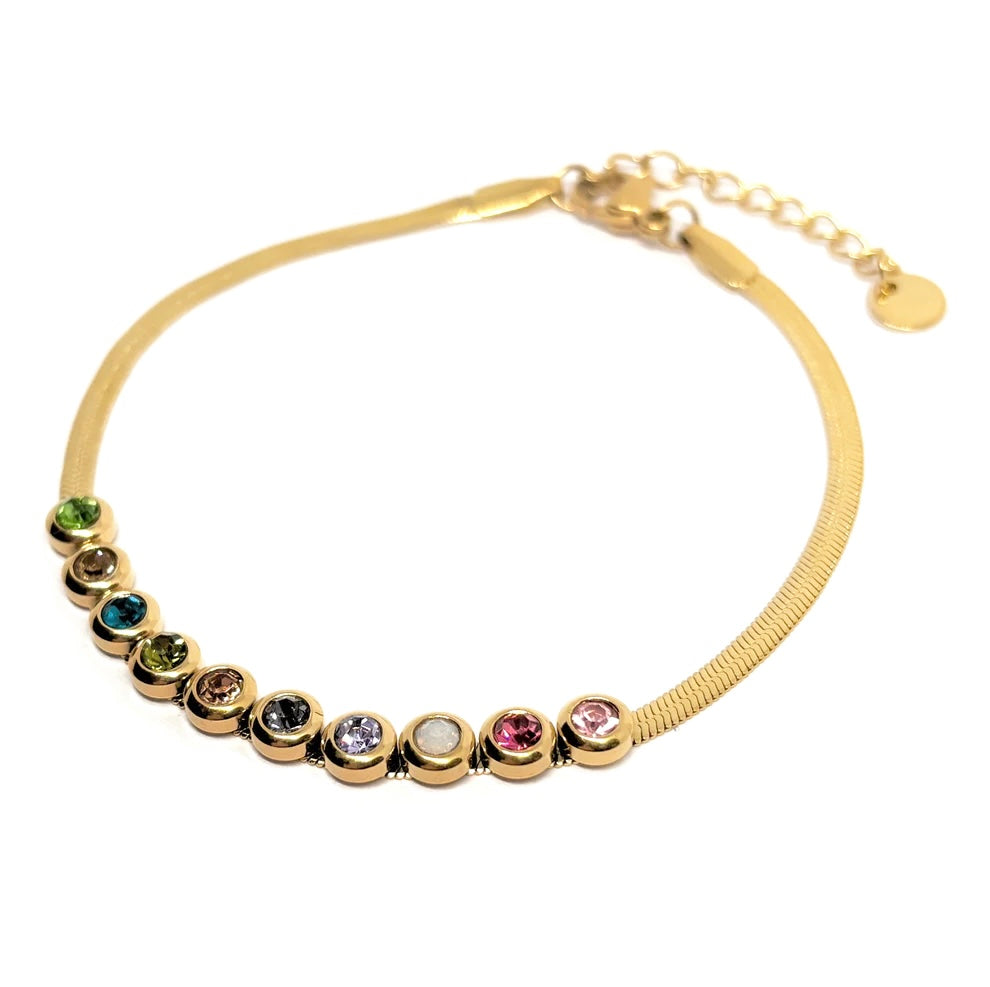 Bracelet femme doré en acier inoxydable plaqué or 18K, orné de 9 cristaux multicolores sertis sur une chaîne fluide. Bijou tendance, coloré et raffiné, hypoallergénique et résistant à l’eau, idéal pour un look lumineux et joyeux