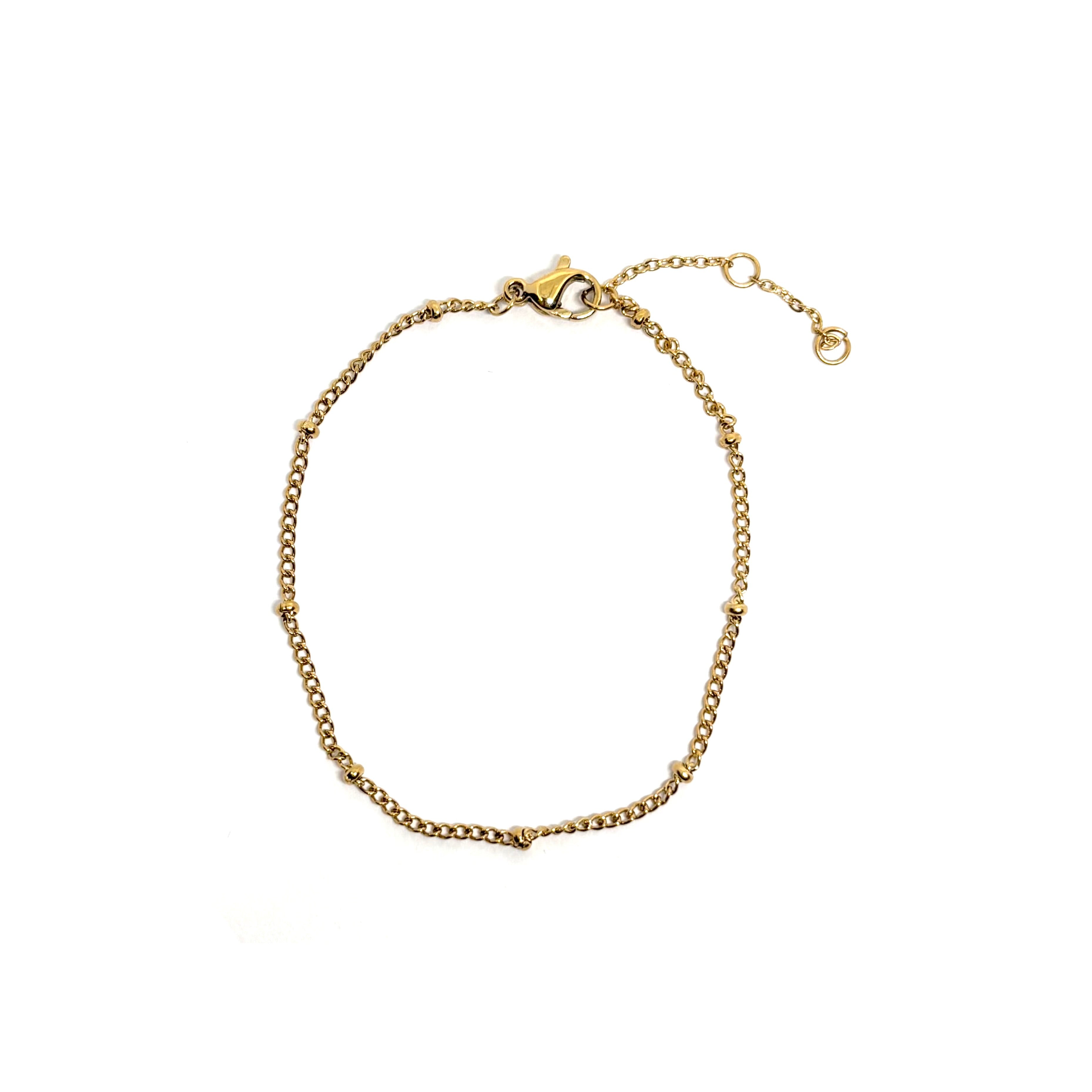 Bracelet femme en acier inoxydable couleur doré 14K à maille fine perlée. Bijou minimaliste et élégant, résistant à l’eau, hypoallergénique et ajustable, parfait pour un look raffiné au quotidien.