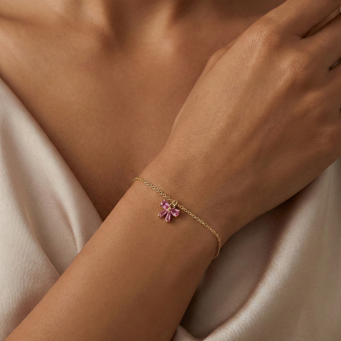 Bracelet nœud rose et pierre grenat en acier inoxydable doré
