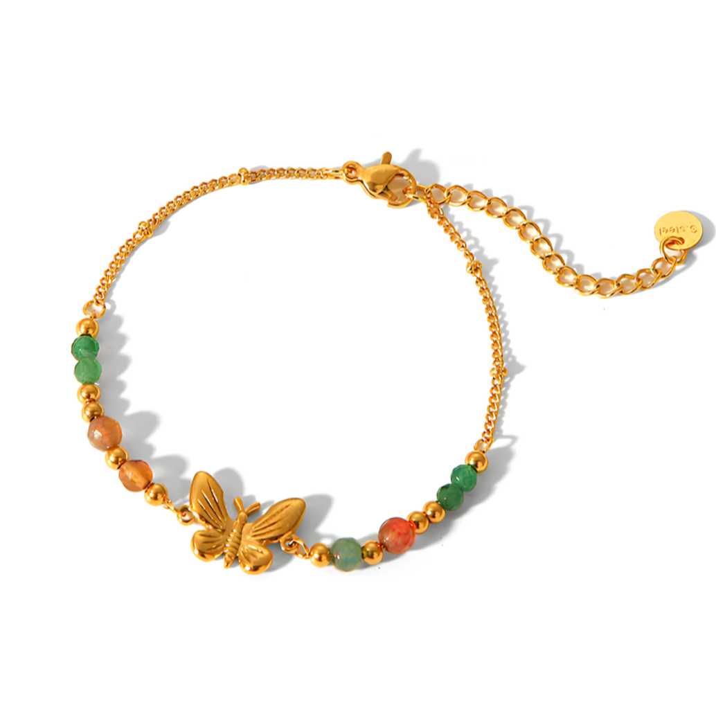 Un bracelet délicat et raffiné, sublimé par un papillon doré en relief et une rangée de perles vertes, orange et dorées aux nuances douces et naturelles.

Matériaux : Acier inoxydable doré – hypoallergénique, résistant à l’eau, finition lisse et brillante.

Dimensions : Longueur 17 + 4,5 cm – motif papillon 1,43 x 1,09 cm – poids 3,2 g.

Style : Ce bijou évoque la légèreté printanière. Discret et poétique, il s’adapte à tous les poignets grâce à sa chaîne réglable.

Un accessoire fin et symbolique, parfait 