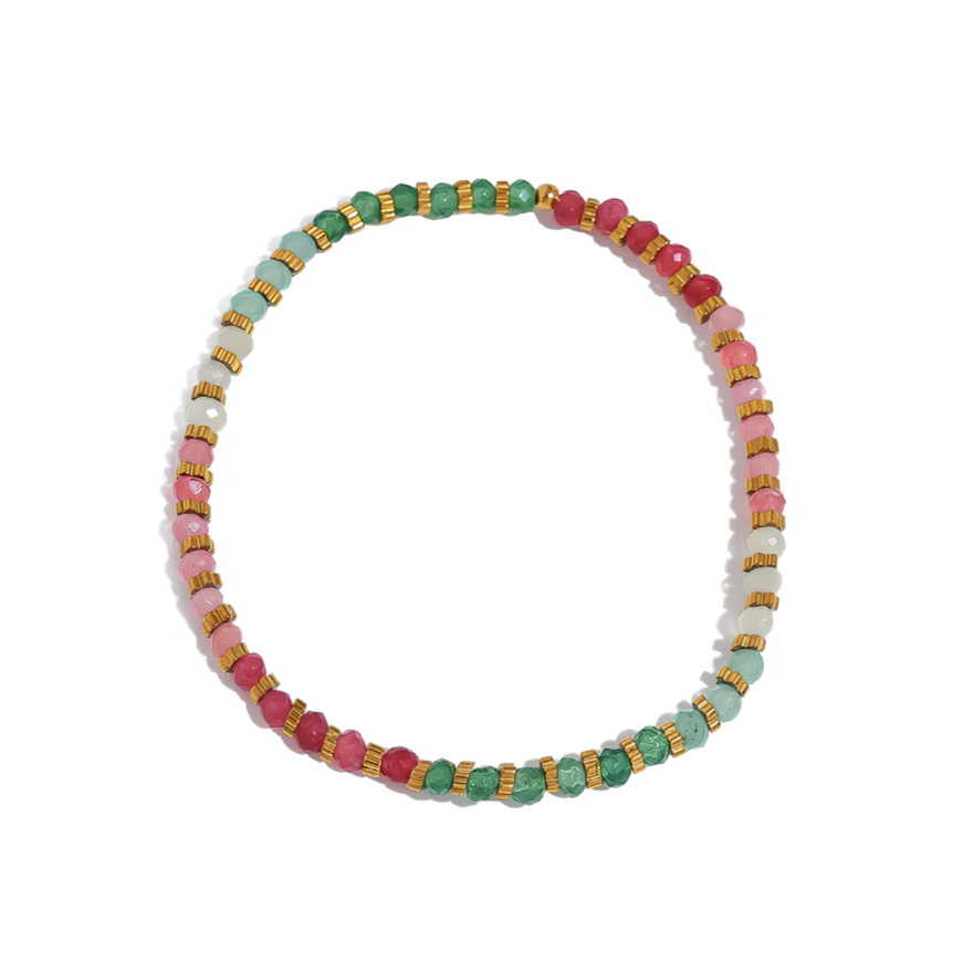 Ce bracelet élastique multicolore allie des perles en cristal facetté aux tons turquoise, rose et rouge, rehaussées de perles dorées pour un rendu à la fois vif et lumineux. Léger, confortable et ultra-facile à porter, il apportera une touche vitaminée à vos looks estivaux.

Matériaux : Acier inoxydable doré PVD 18K – cristal coloré – résistant à l’eau, ne ternit pas. Élasticité souple, facile à enfiler.

Dimensions : Diamètre intérieur 16 cm – largeur des perles 3,5 mm – poids : 2,8 g.

Style : Un bracelet