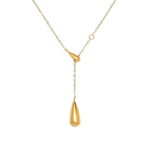 Collier couleur or en acier inoxydable avec pendentif goutte d’eau minimaliste.